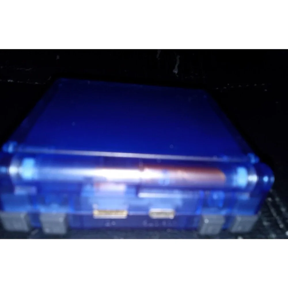 Anbernic Rg35xxsp transparent blue handheld